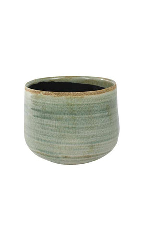 A rustic handcrafted ceramic como pot with matte sage green premium glaze and subtle horizontal ridges 17-21cm diameter