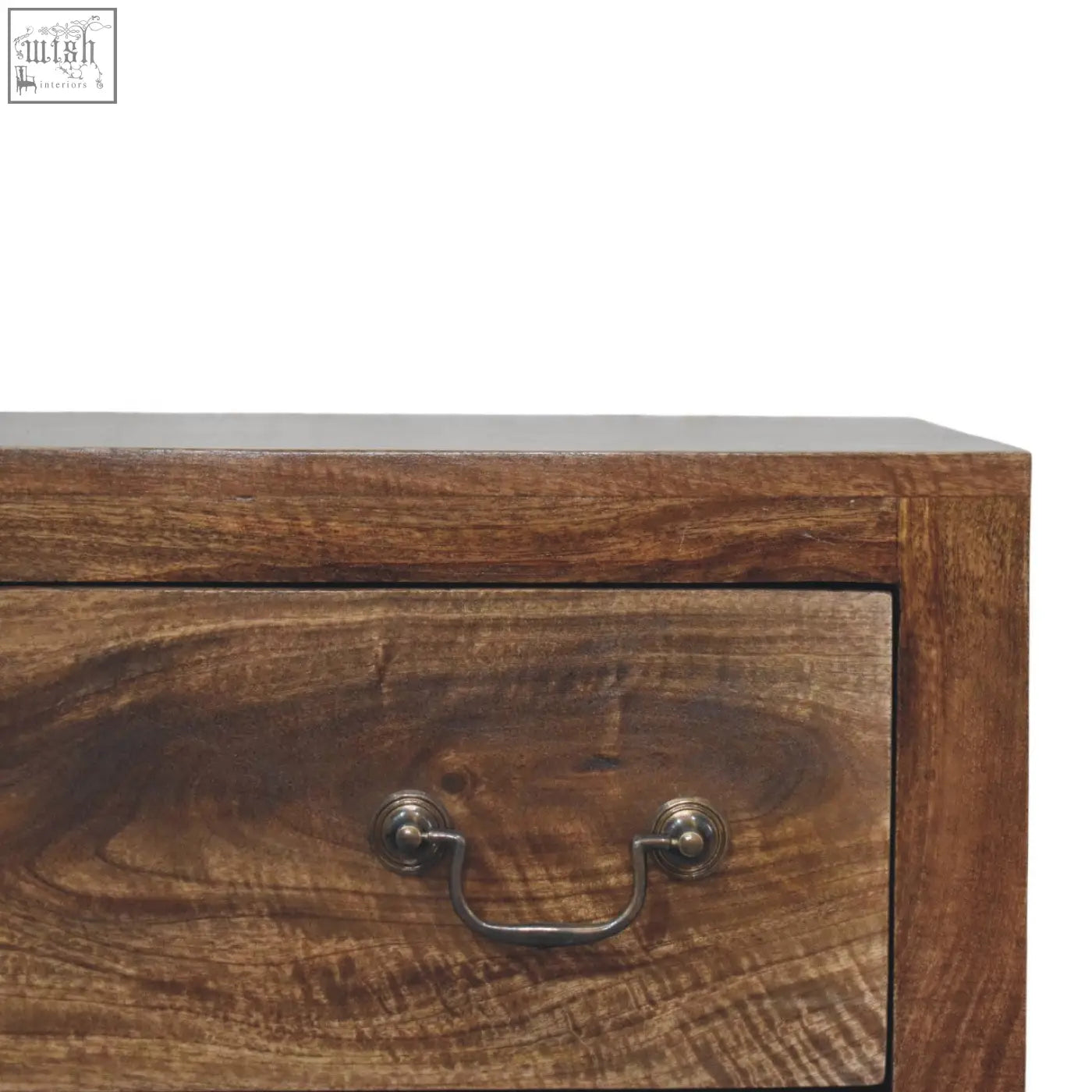 Compact three drawer chest with dark brown wood and vintage metal handles showing rustic grain texture