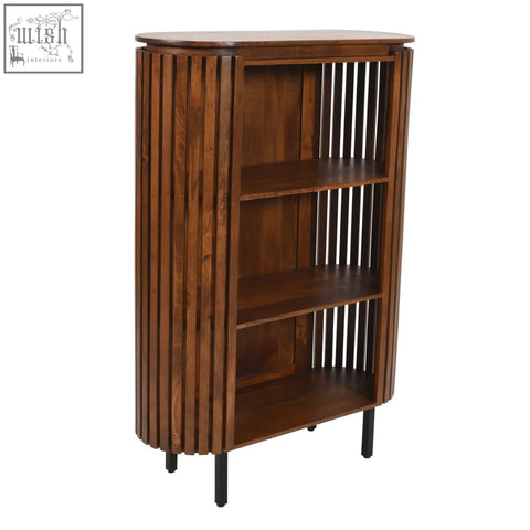 Dark brown compton mango wood bookcase with vertical slats and circular black metal legs for stylish storage