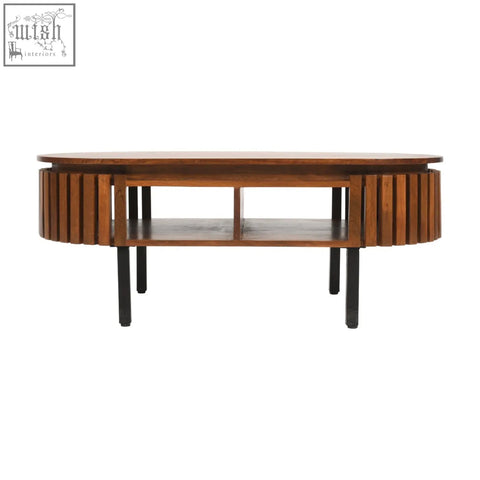 Compton mango wood coffee table with warm brown top slatted sides and sleek black round metal legs