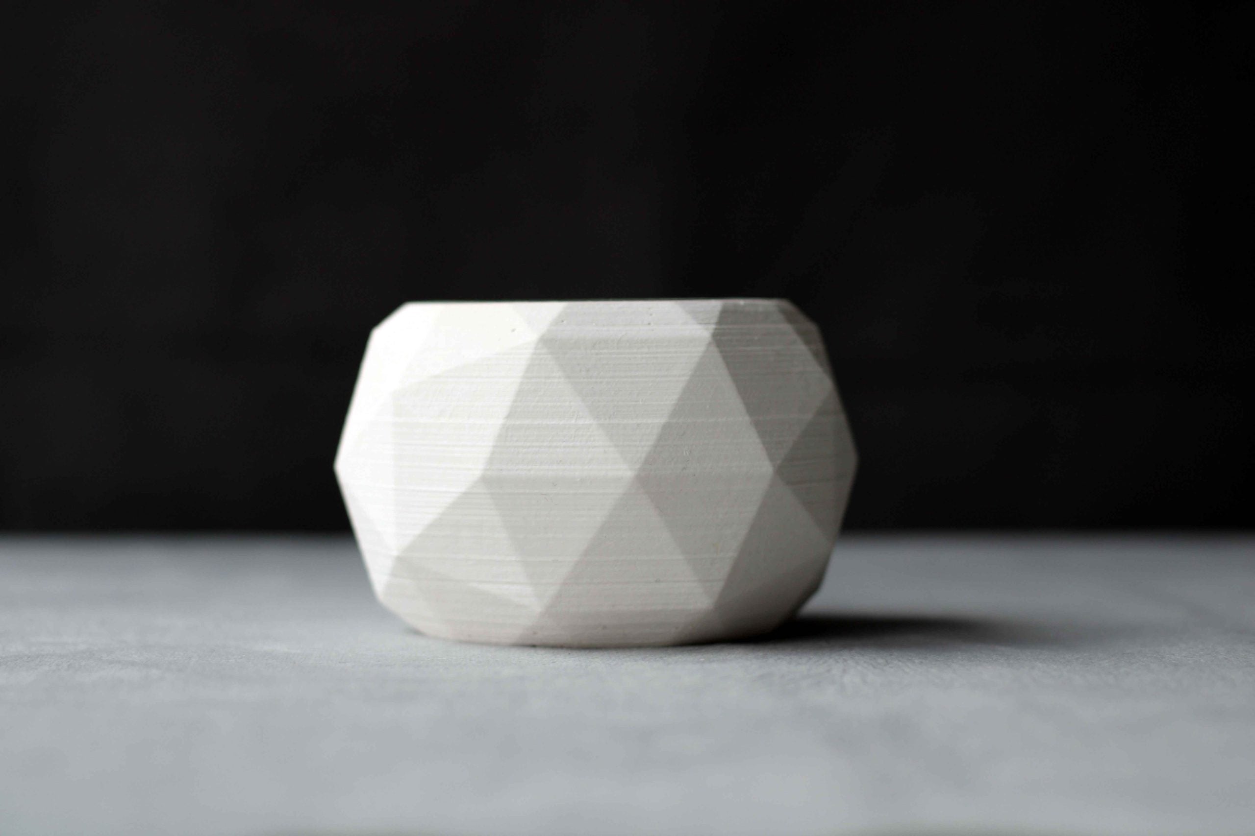 White high quality ceramic concrete diagonal pot with faceted geometric polygonal design for plants
