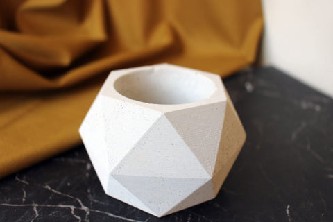 White geometric concrete hexagonal pot with faceted angular design modern concrete planter for indoor use