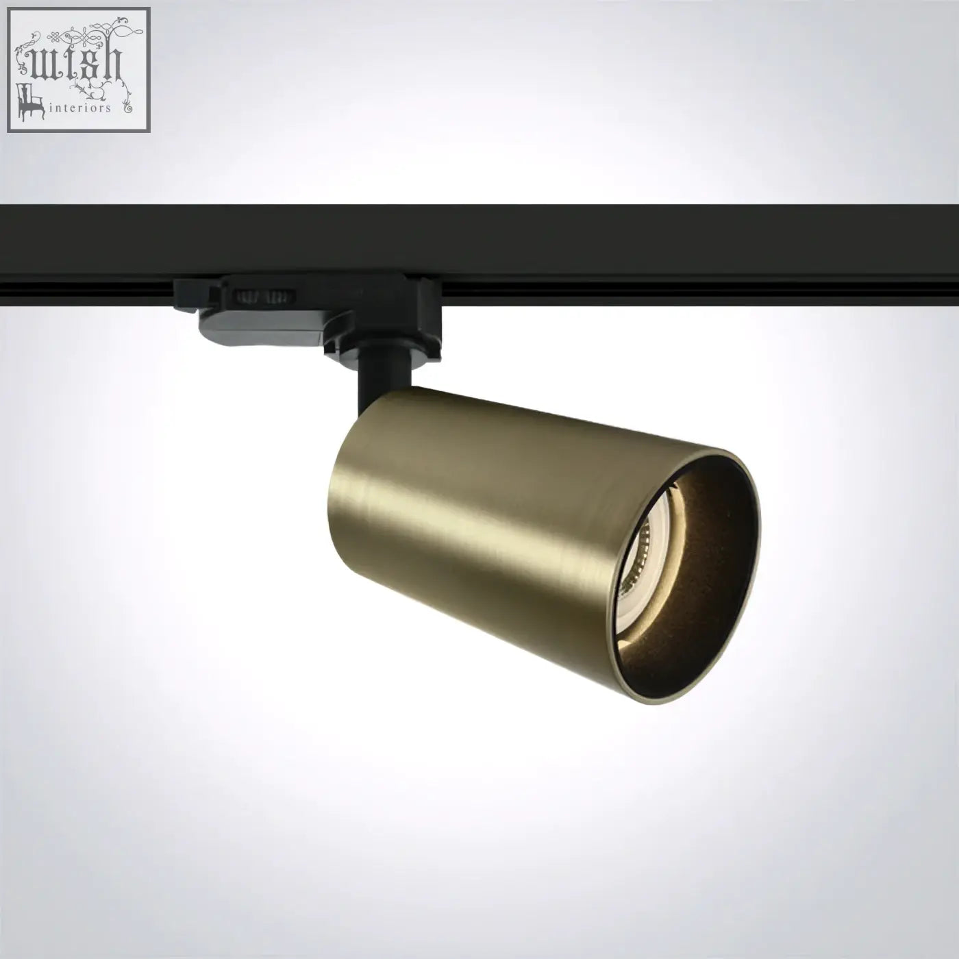 Brass-finished cone gu10 track light with sleek modern design mounted on black rail meets standard en60598-1