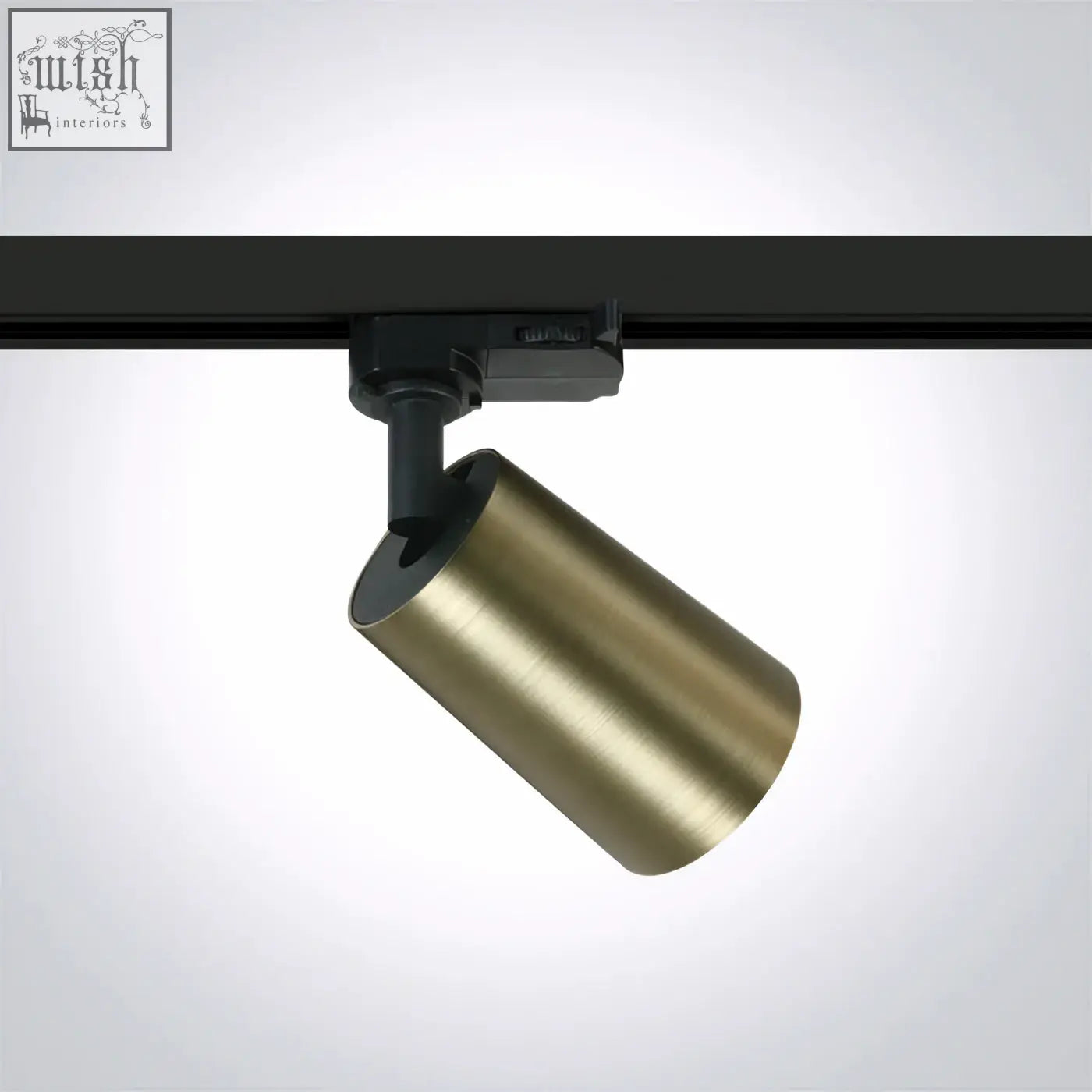 A sleek brushed brass cone gu10 track light with a black mounting bracket meeting standard en60598-1