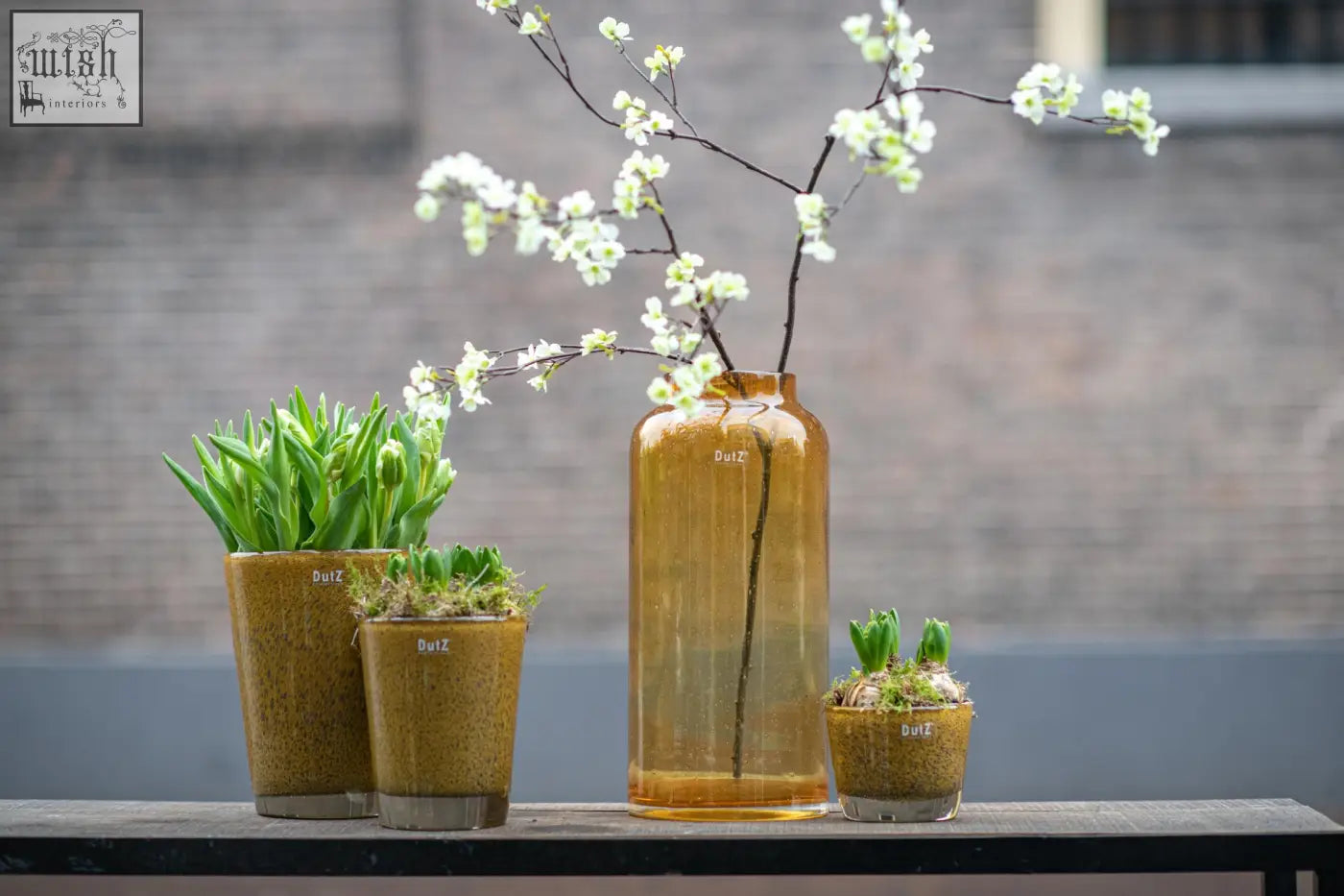 Tall amber conic vase from dutz collection made of mouth blown thick glass with bubbles and subtle textured finish