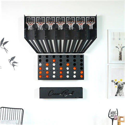 Black wall-mounted connect balls arcade game with five hoops and tray holding four balls as central piece