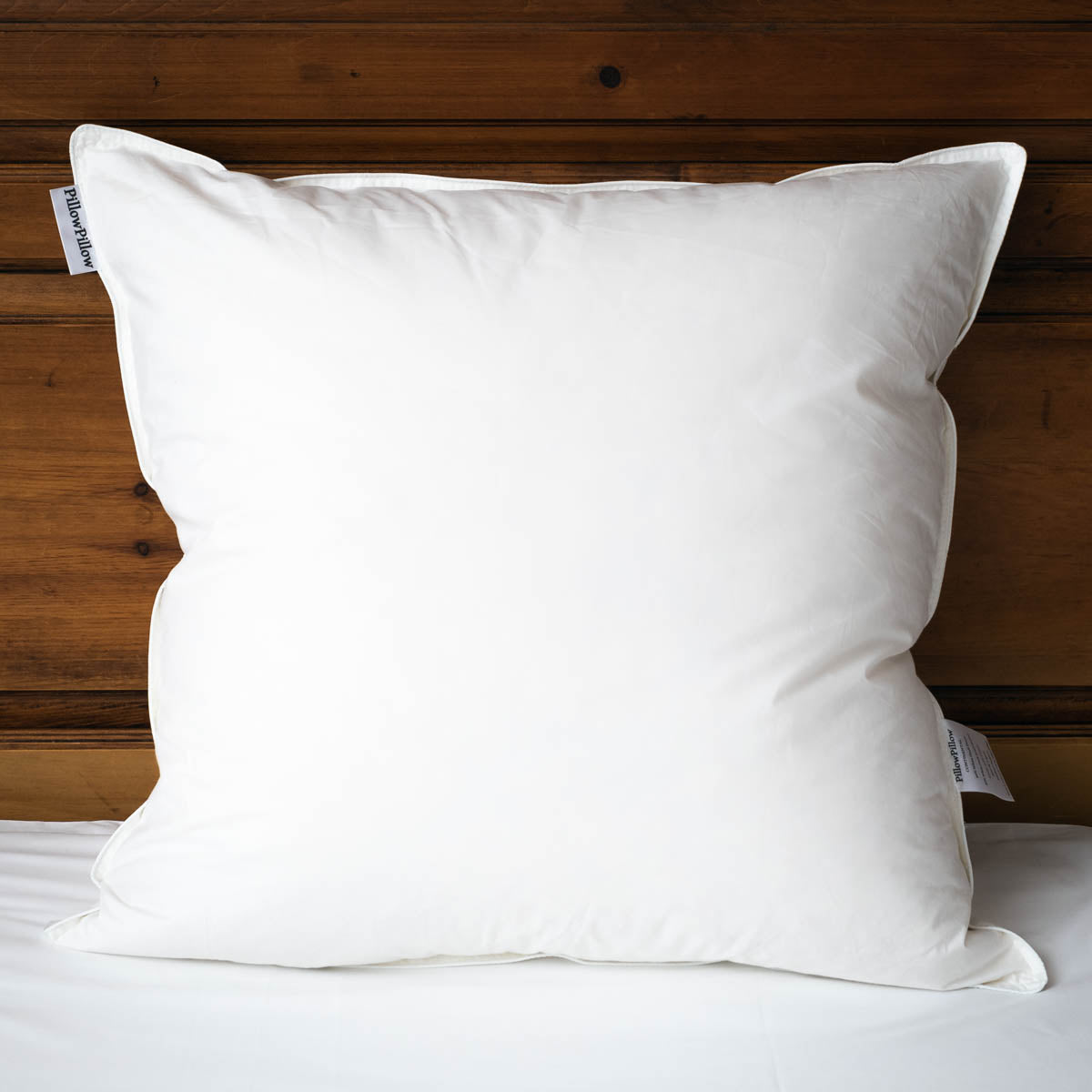 Continental the big square one white duck pillow with smooth shiny fabric and subtle edge stitching