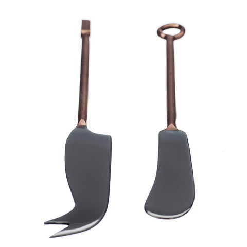Set of 2 copper cheese knives with copper handles and dark gray ceramic blades for cutting and spreading cheese