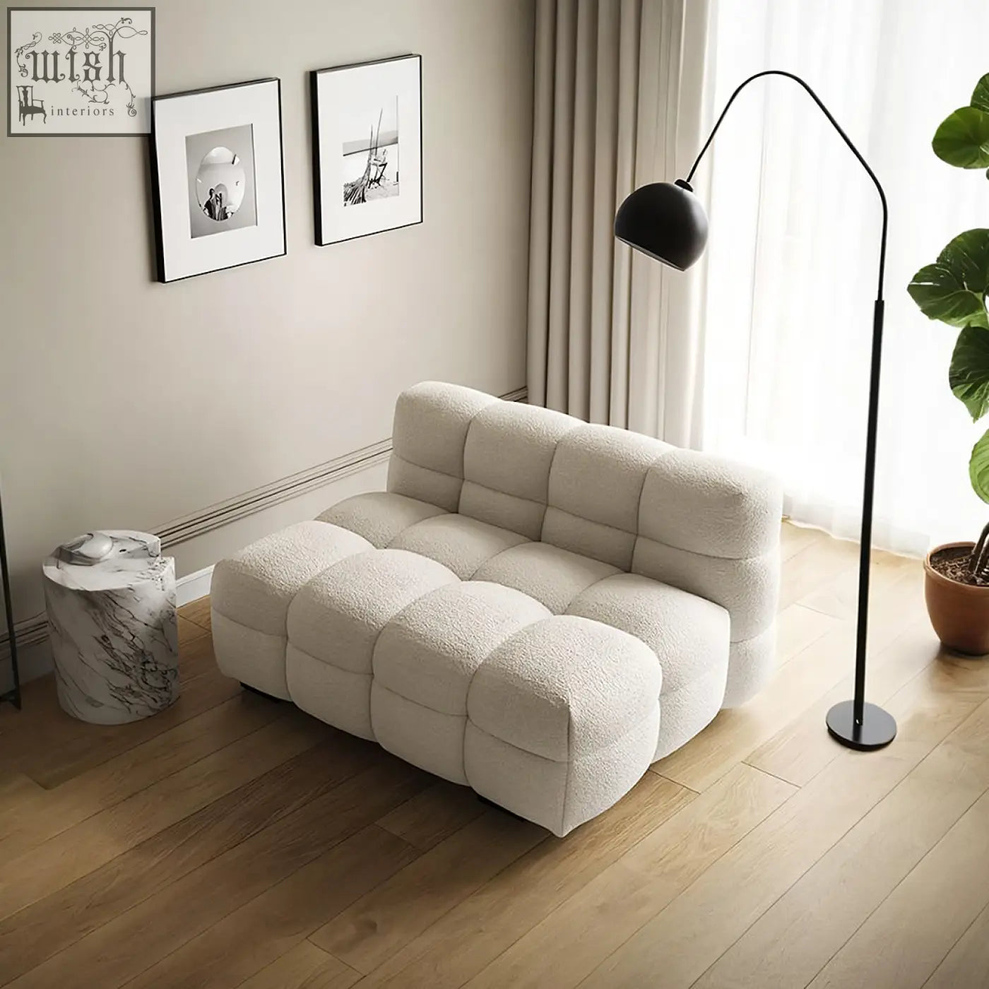 Cream-colored plush boucle two seater sofa with tufted cube-like design perfect for lazy lounging