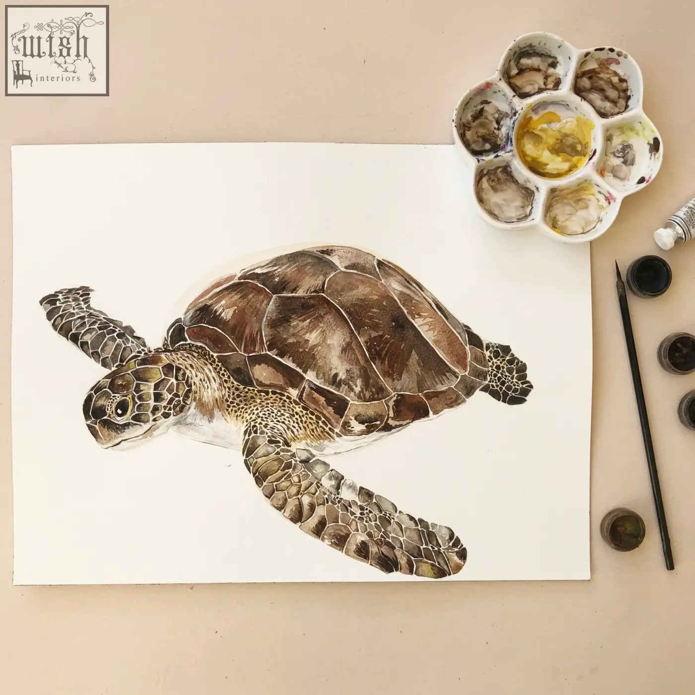 A detailed watercolor sea turtle with brown and black shell on white paper featured in coral reef mural wallpaper 52cm wide
