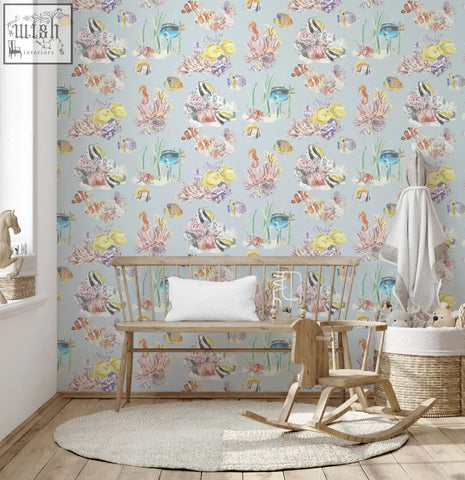 Pastel blue coral reef watercolour wallpaper featuring colorful tropical fish and vibrant coral patterns