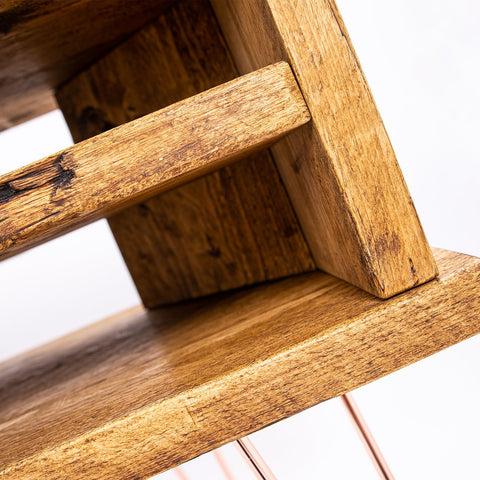 Rustic corner tv and display stand made from bespoke wooden unit with natural grain and imperfections visible
