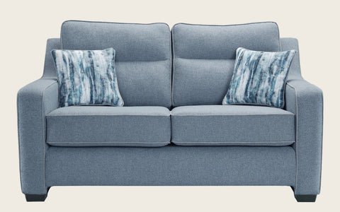 Modern gray fabric cornwall sofa loveseat with shaped square arms and two matching striped throw pillows