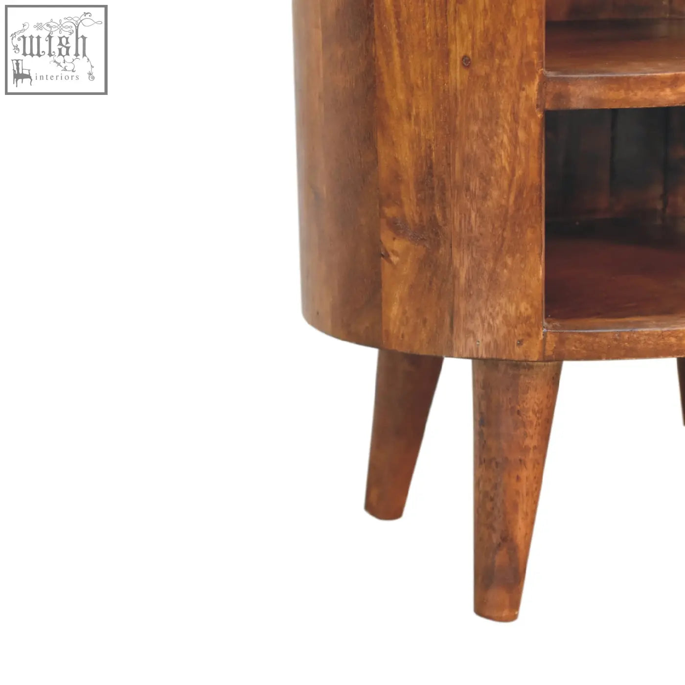 A rustic medium brown cortez chestnut bedside table made of solid mango wood with cylindrical body and tapered legs