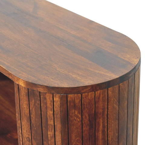 Rich brown wooden cortez chestnut open cabinet console table with curved top and vertical slat detailing