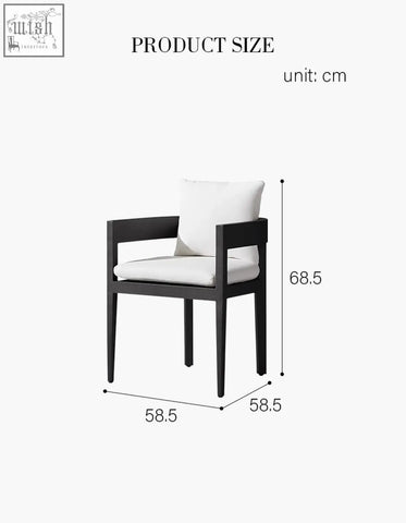 Black framed armchair with white cushions as part of cortez outdoor dining table set for outdoor dining use