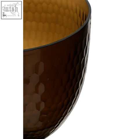 Amber-colored cortina large honeycomb candle holder made of hammered glass with a textured large honeycomb glass pattern