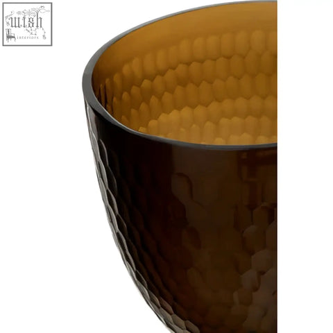 Amber-colored cortina large honeycomb glass candle holder with textured hammered exterior and smooth interior bowl