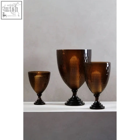 Set of three amber glass goblets with black bases and gold leaf pattern perfect for cortina large honeycomb candle holder