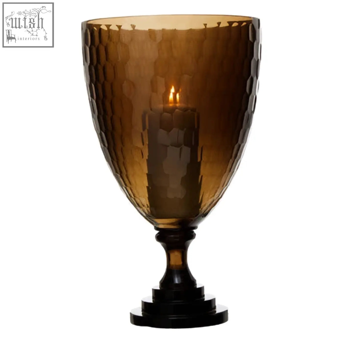 Amber-colored hammered glass candle holder with dark wooden base cortina medium honeycomb glass candle holder