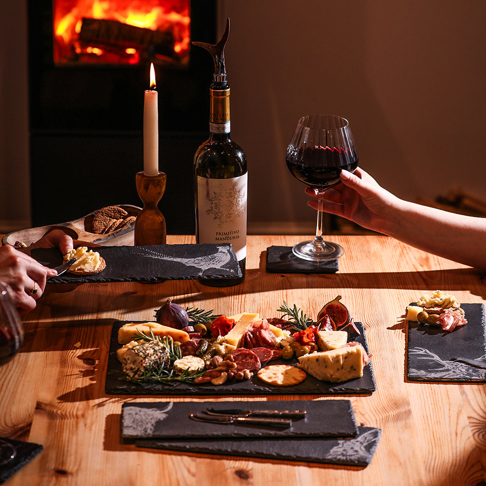 Black slate mini slate cheese board with assorted cheeses meats and garnishes from country animals set of 4