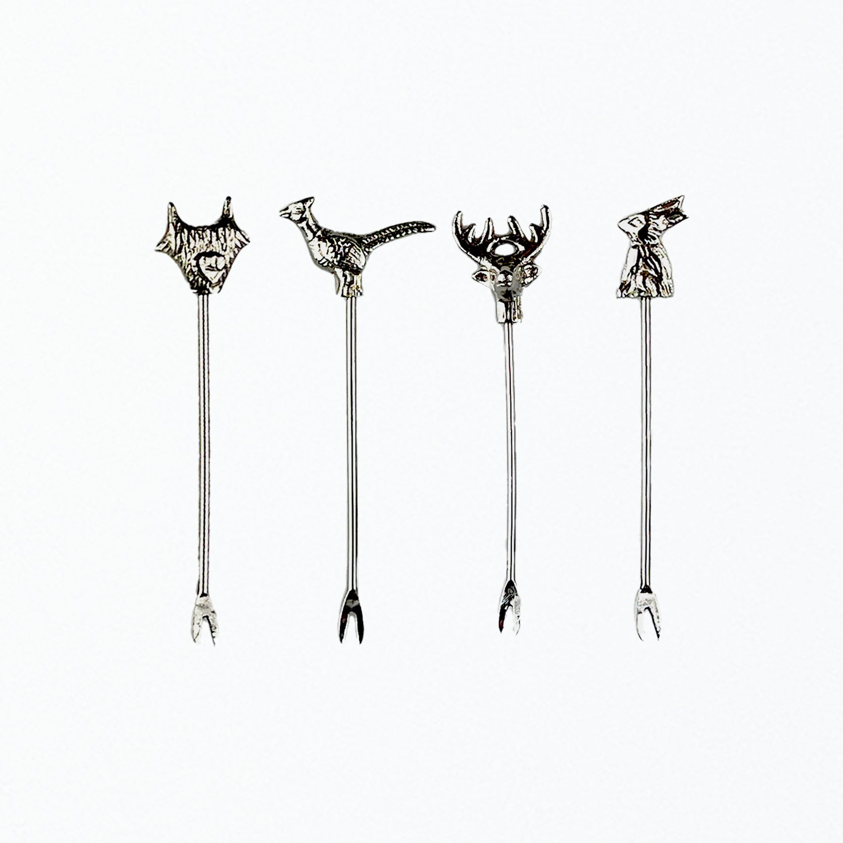 Set of four silver-toned country animals olive picks featuring fox pheasant stag and rabbit carved heads with fork tips