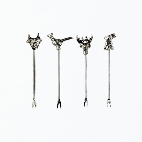 Set of four silver-toned country animals olive picks featuring fox pheasant stag and rabbit carved heads with fork tips