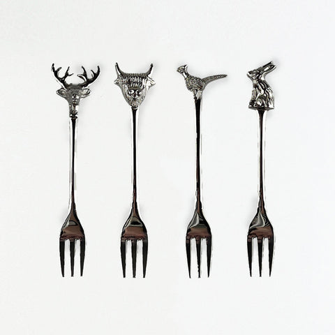 Set of 4 silver country animals pastry forks with deer highland cow pheasant and rabbit carved heads and slender handles