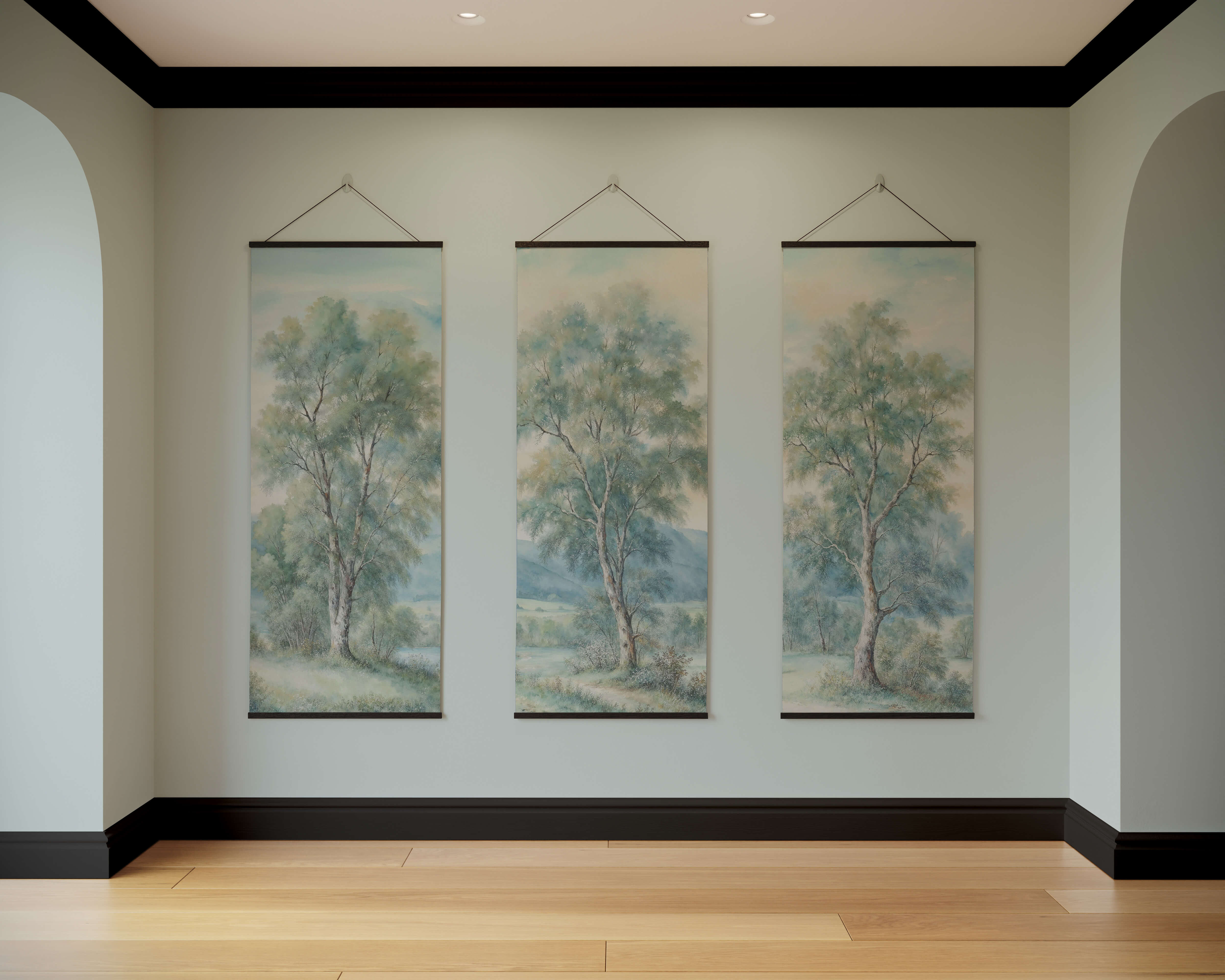 Three vertical canvas paintings in black frames showing green and blue trees as a countryside tapestry wall art