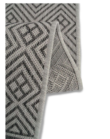 County geo grey indoor outdoor rug with gray and black geometric pattern and textured neutral-toned border