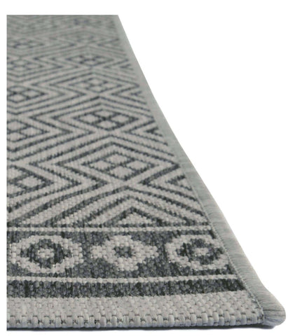 Gray geometric-patterned county geo grey indoor outdoor rug with textured weave and neutral tones perfect for any space