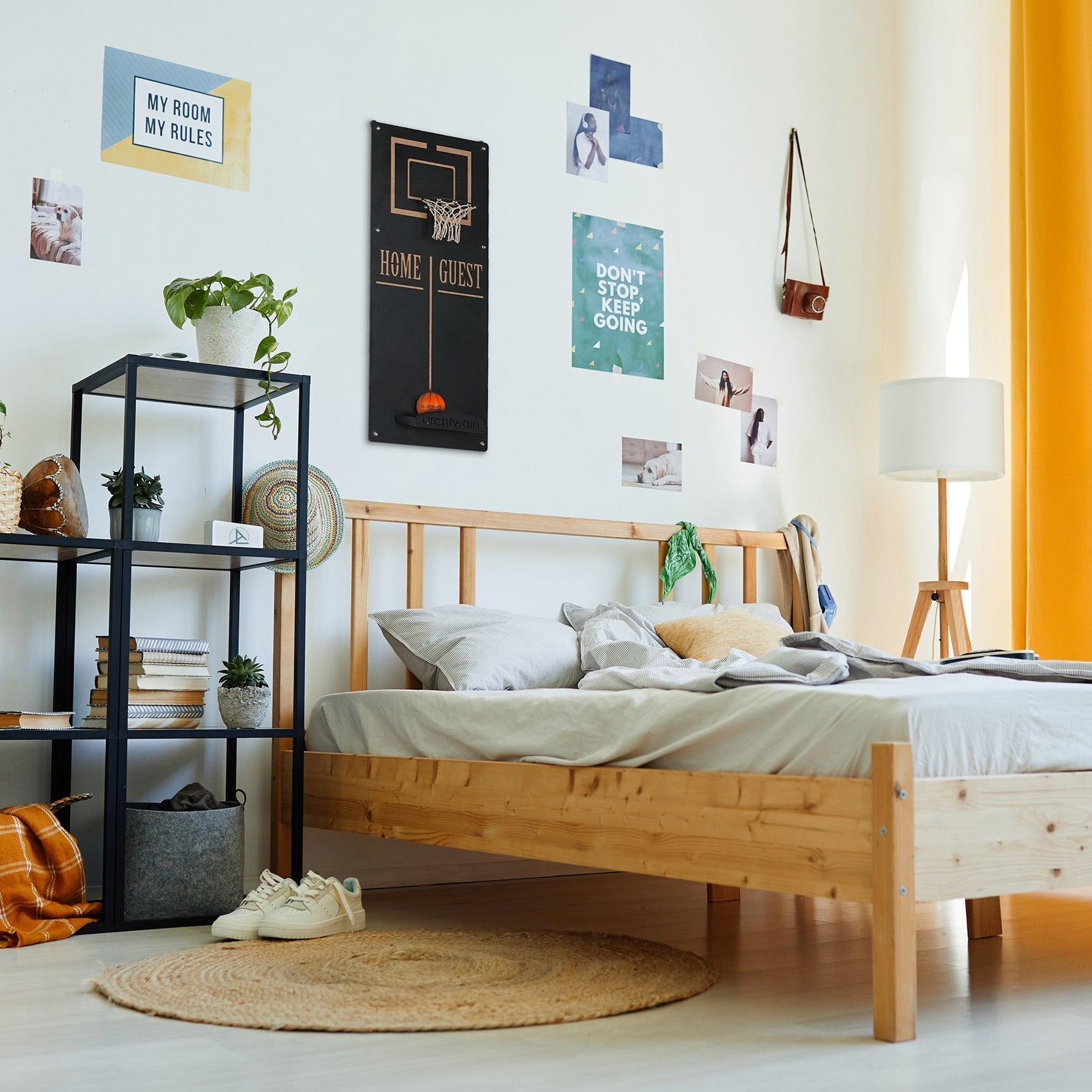 Light-colored wooden bed frame with simple slatted design and natural wood grain finish for basketball wall game target area