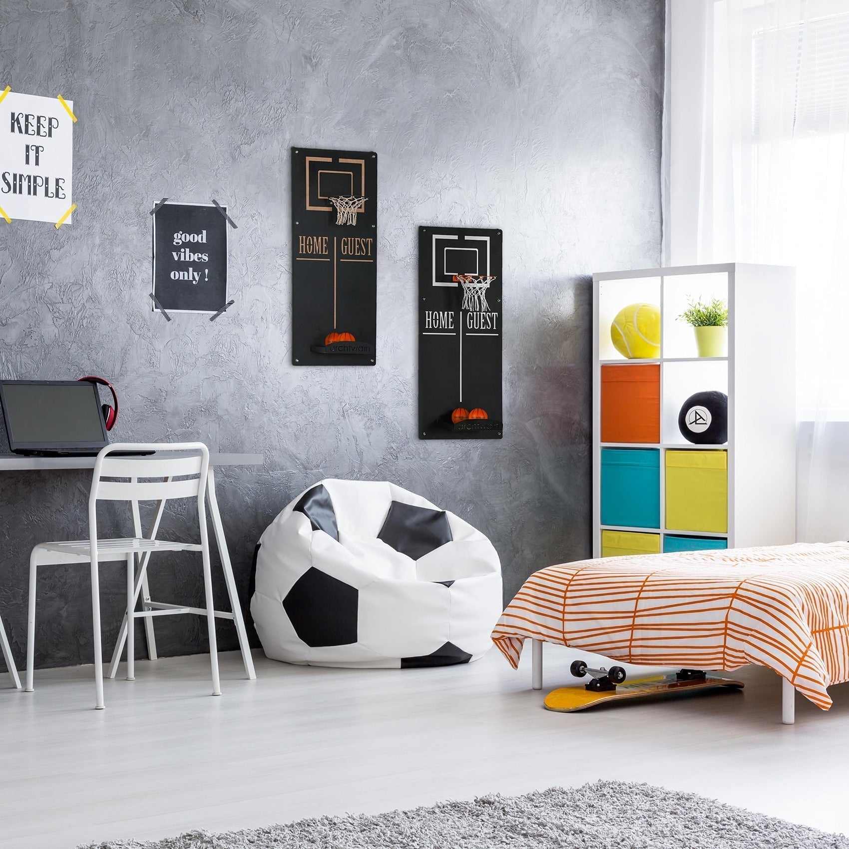 White and black soccer ball-shaped beanbag chair perfect for the basketball wall game target area fun and comfy seating