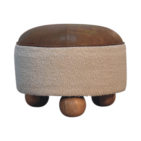 Cream boucle buffalo footstool with brown leather top beige faux fur body and wooden ball feet for cozy seating