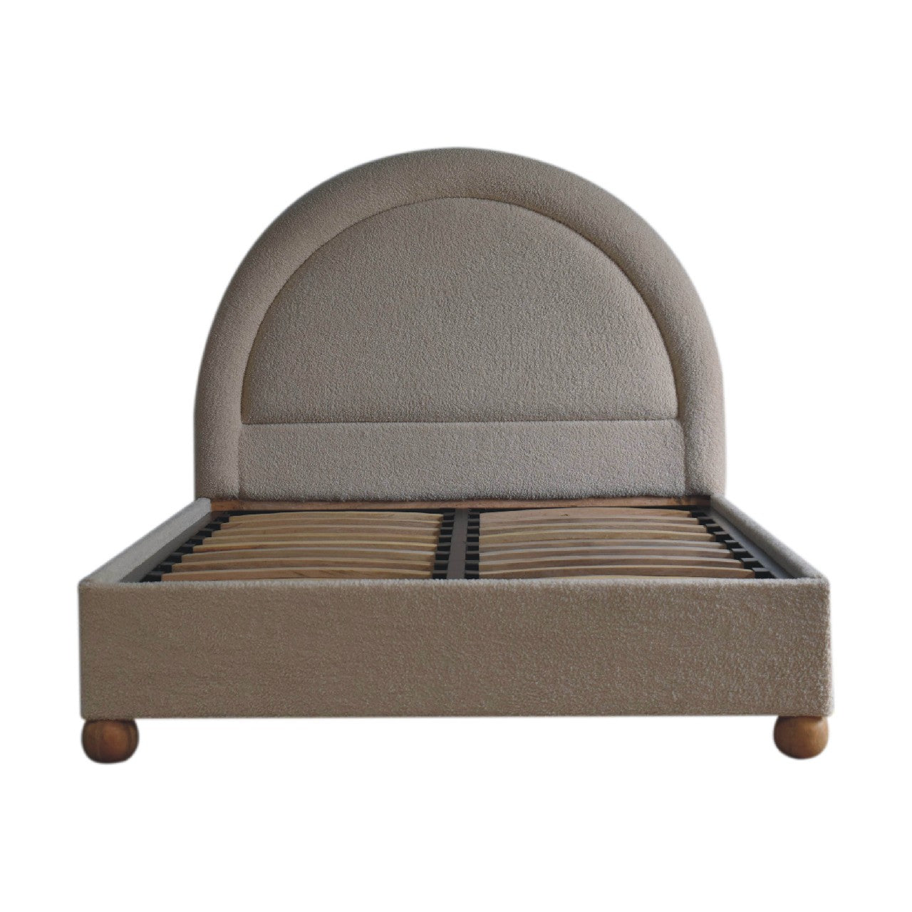 Cream boucle double bed with beige upholstered curved headboard and wooden legs perfect for cozy bedrooms
