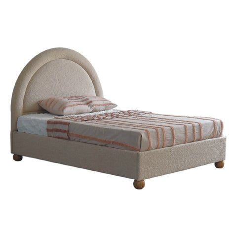 Cream boucle double bed with beige upholstered curved headboard and wooden ball feet