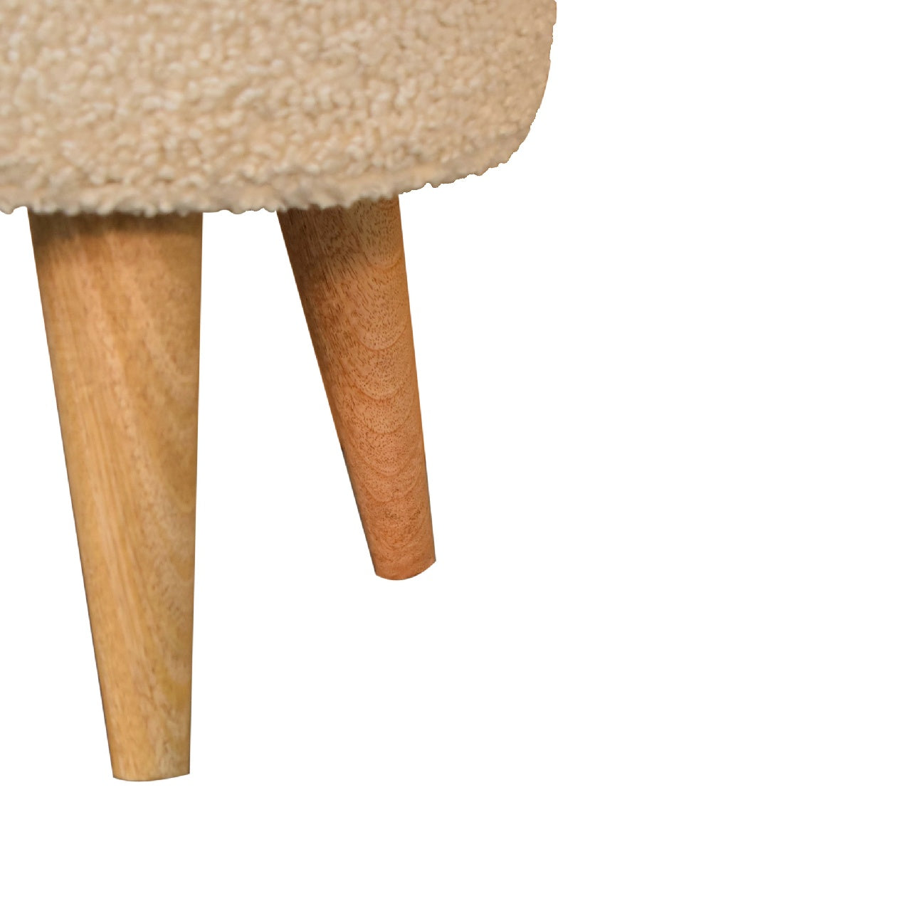 Cream boucle petite footstool in beige faux fur with tapered wooden legs perfect for cozy seating or decor