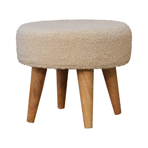 Cream boucle petite footstool with cream sheepskin textured round seat and tapered wooden legs