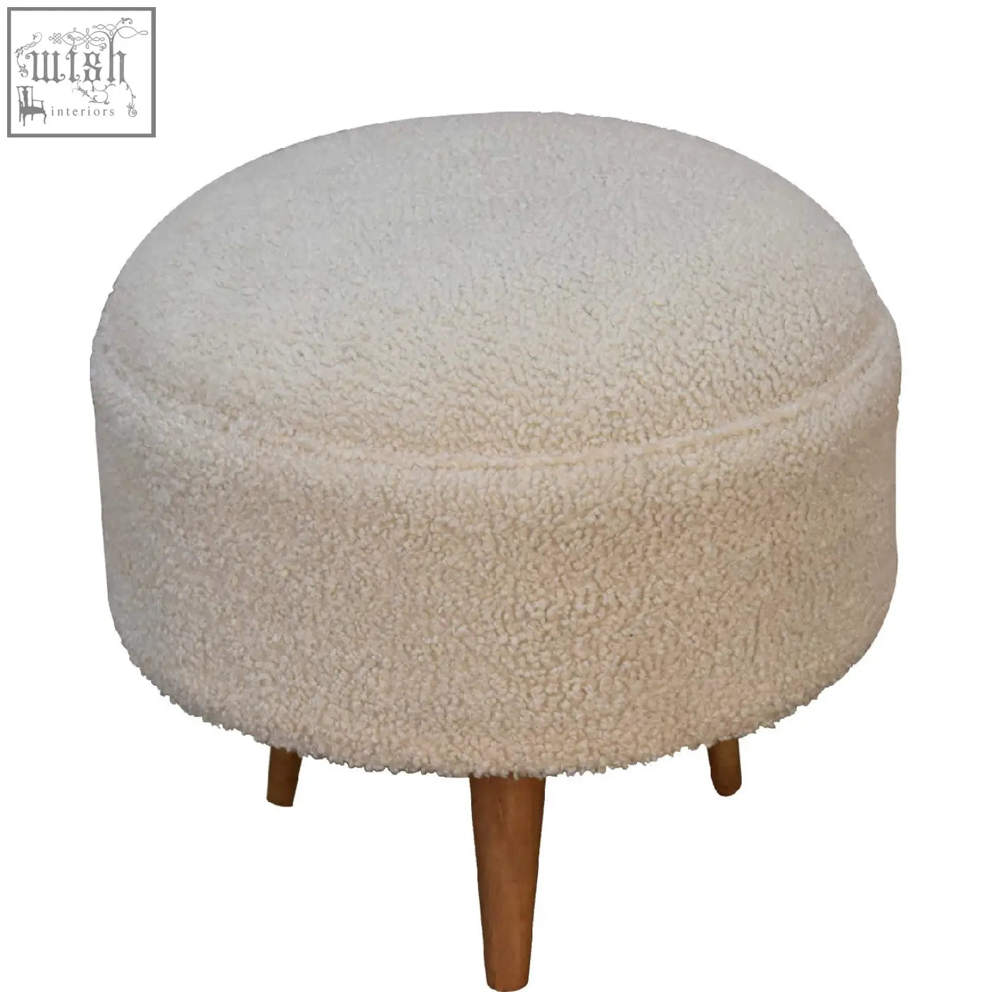 Cream boucle rounded footstool with cream sheepskin texture and mango wood legs perfect for cozy seating