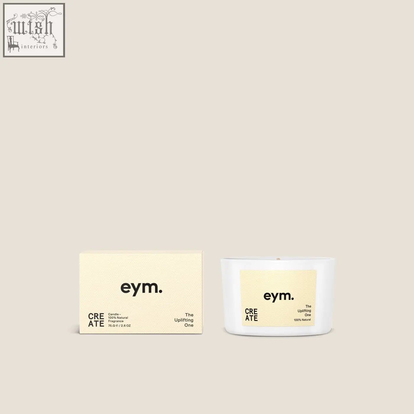 White ceramic mini candle with pale yellow label and black text shown with matching minimalist box