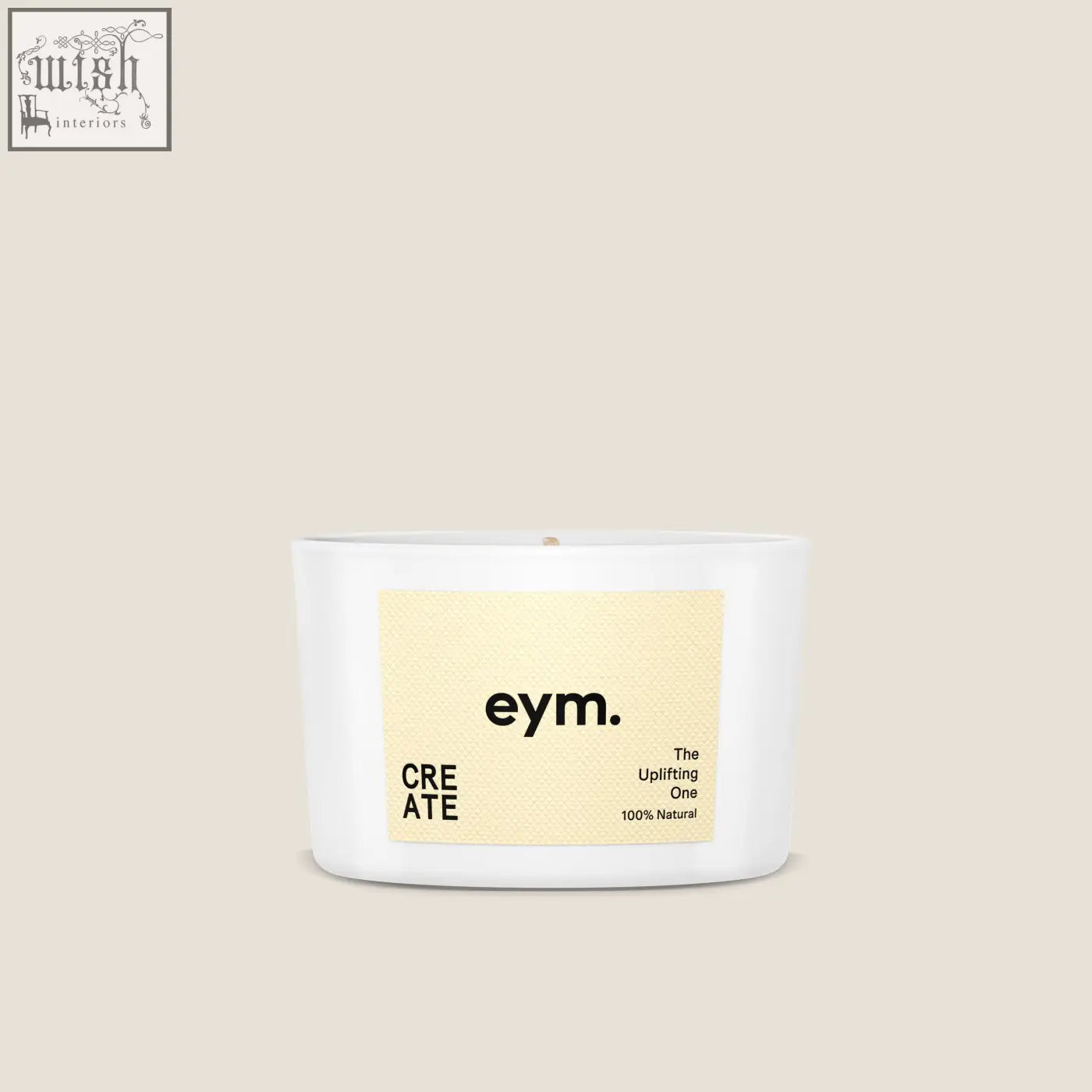 A white cylindrical mini candle in a minimalist container with a beige label from eym called the uplifting one
