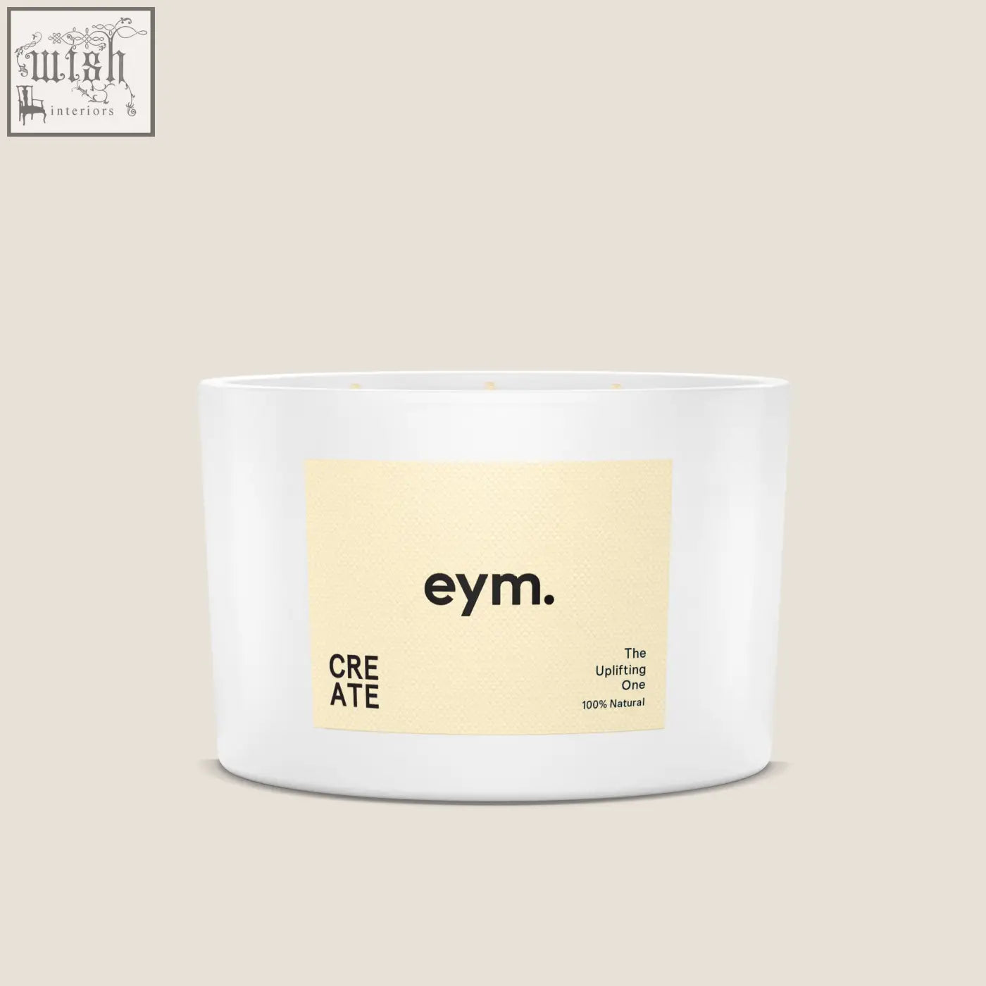 A white cylindrical three wick candle from eym with a pale yellow label called the uplifting one 100% natural