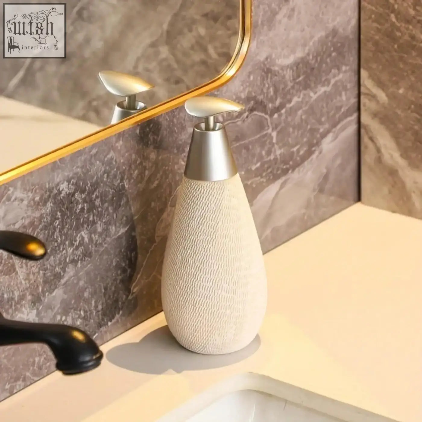 Cream-colored ceramic retro style soap dispenser with textured body and sleek silver pump for hand soap use