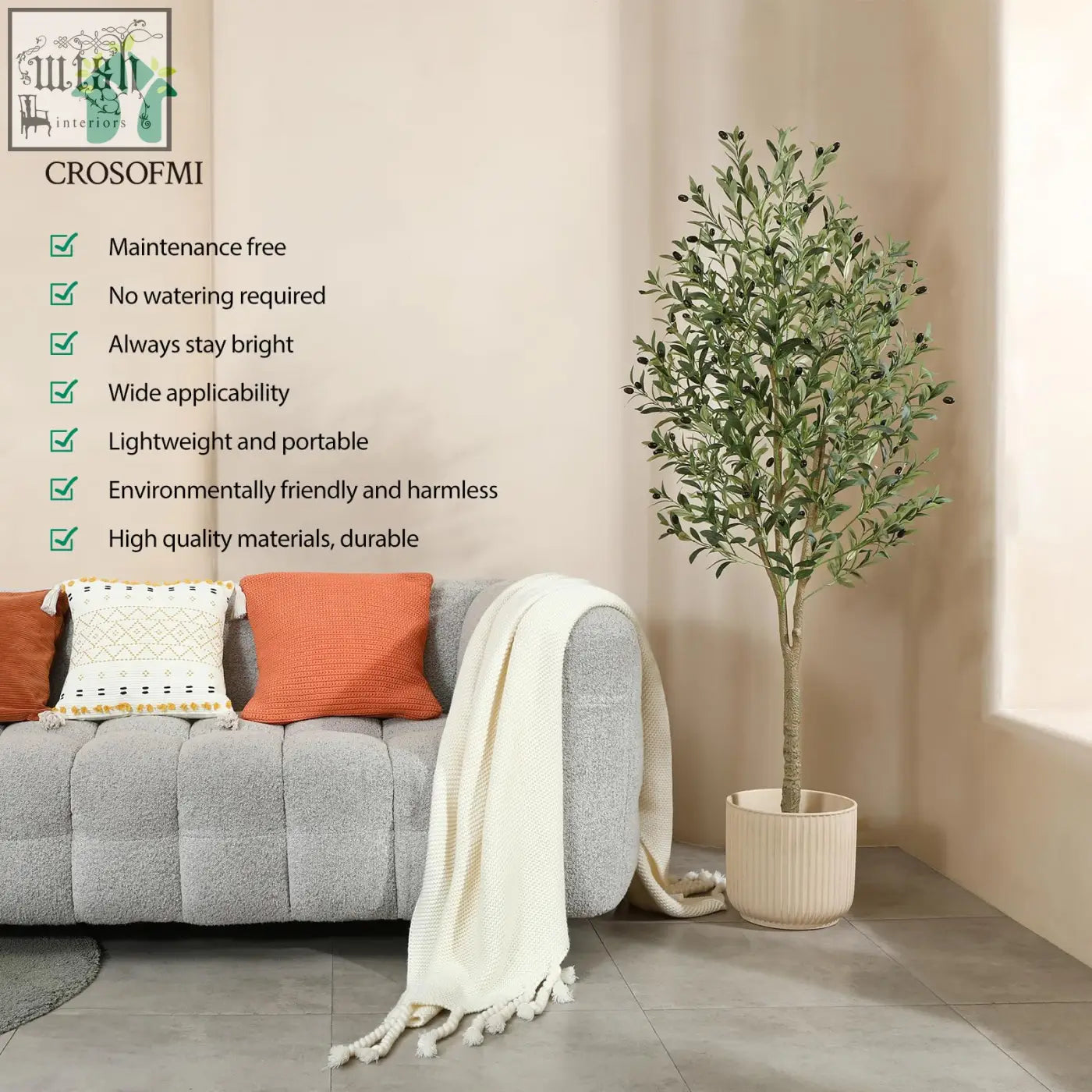 A tall artificial olive tree with green leaves and dark olives in a beige ribbed pot for indoor decor