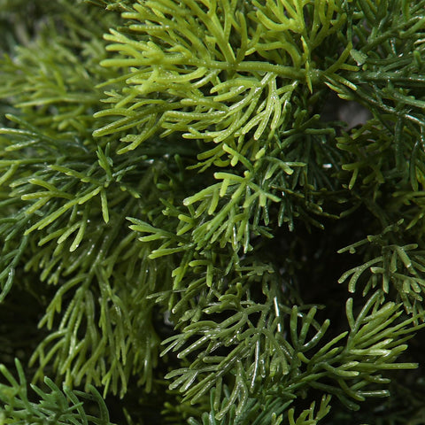 Vibrant green artificial cedar tree with feathery fronds and glossy finish in plastic pots for outdoor decoration