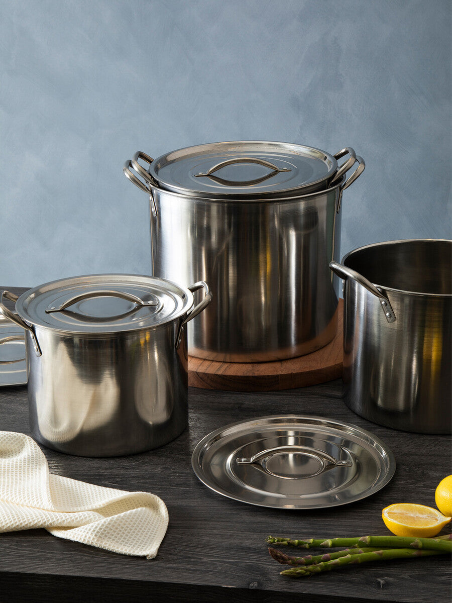 Set of three classic silver crosse stock pots with lids made of stainless steel and sturdy handles