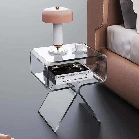 Modern acrylic nightstand with sleek transparent acrylic design and angular legs perfect for stylish bedside use