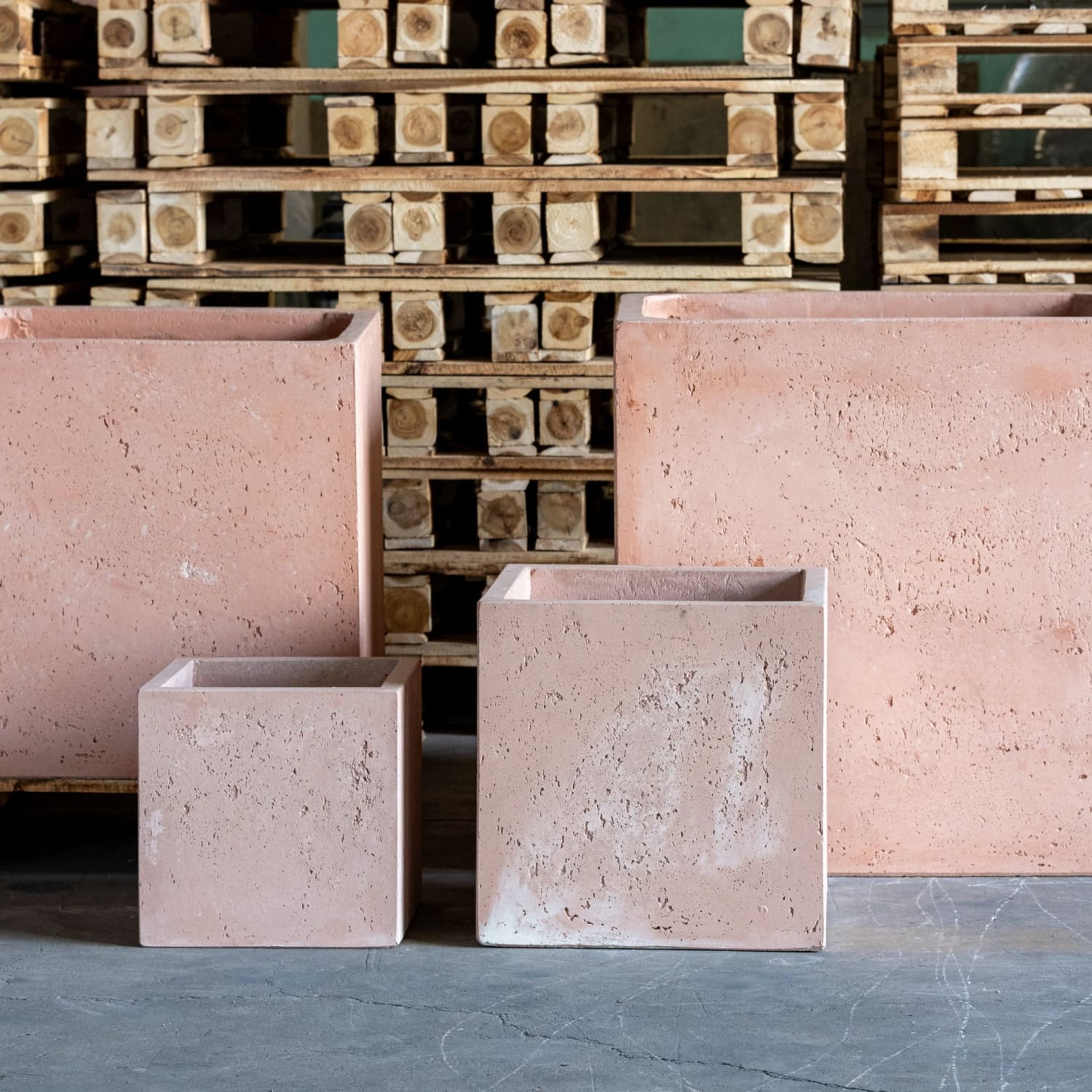 Pink blushstone 20cm square concrete planter with textured stone finish perfect for compact greenery on garden tables