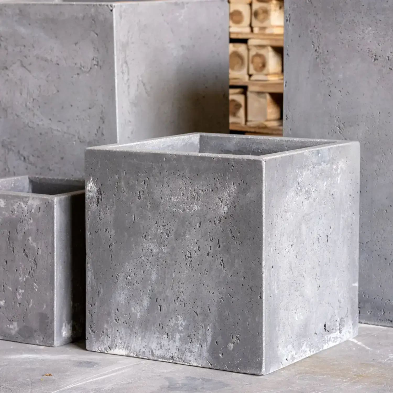 Gray concrete planter in onyx dusk colourway with rustic finish and clean square edges for compact greenery