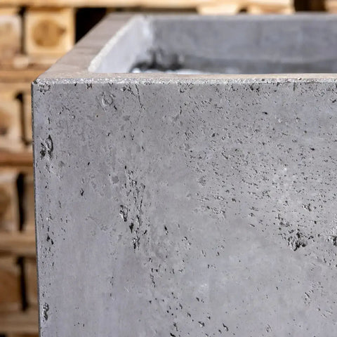 Gray concrete onyx dusk colourway planter with rough textured surface perfect for compact greenery display
